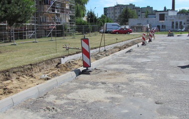 Wymiana nawierzchni drogi i chodnik&oacute;w ul. Piast&oacute;w w m. G&oacute;ra 6