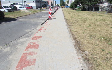 Wymiana nawierzchni drogi i chodnik&oacute;w ul. Piast&oacute;w w m. G&oacute;ra 2