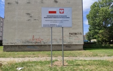 Wymiana nawierzchni drogi i chodnik&oacute;w ul. Piast&oacute;w w m. G&oacute;ra oraz Poprawa stanu nawierzchni jezdni i chodnik&oacute;w ul. J. Korczaka w m. G&oacute;ra 1