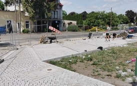Wymiana nawierzchni drogi i chodnik&oacute;w ul. Mickiewicza w m. G&oacute;ra &ndash; etap I 11