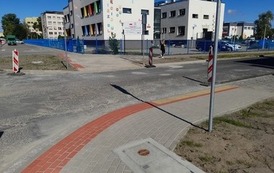 Wymiana nawierzchni drogi i chodnik&oacute;w ul. Piast&oacute;w w m. G&oacute;ra oraz Poprawa stanu nawierzchni jezdni i chodnik&oacute;w ul. J. Korczaka w m. G&oacute;ra 5