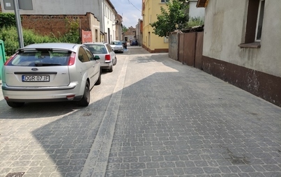 Zdjęcie do Przebudowa dr&oacute;g w zakresie wymiany nawierzchni jezdni i chodnik&oacute;w ul. Mała i Dąbrowskiego